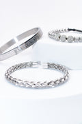 Set de pulseras plateadas — pulsera rígida con numerales + trenzada + cuentas pavé