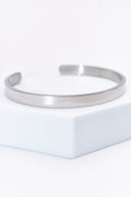 Pulsera rígida lisa plateada — acero inoxidable