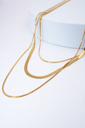 Collar triple capa serpiente dorado