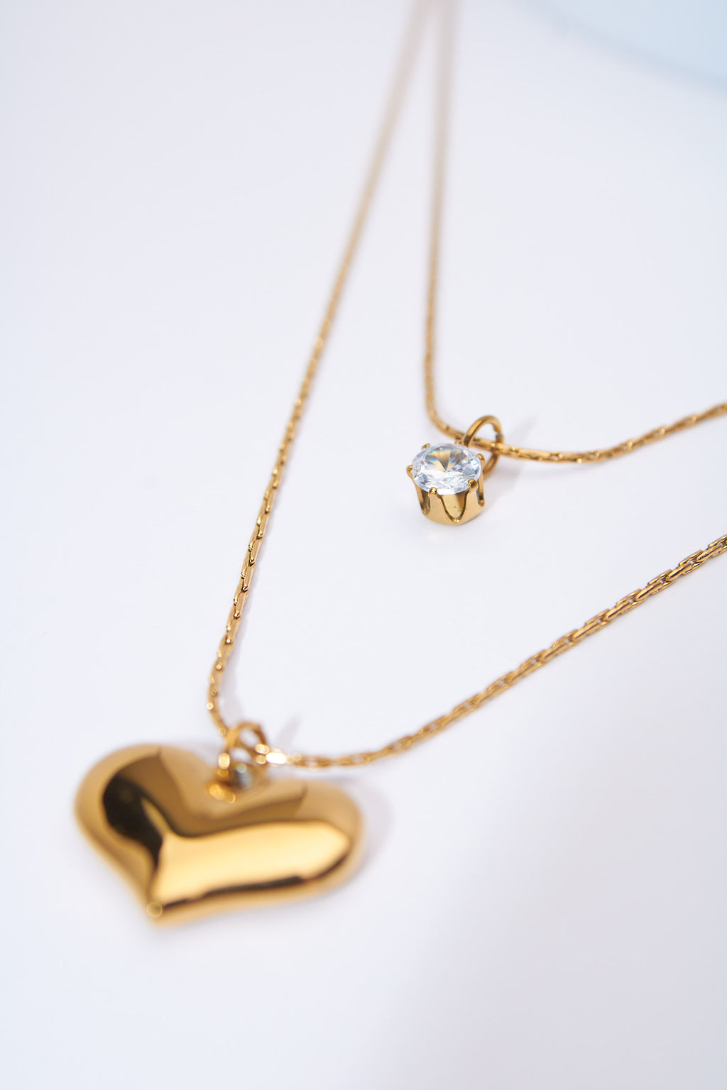 Set collares doble capa corazón + solitario brillante — baño dorado