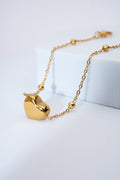 Pulsera corazón macizo dorado — baño dorado