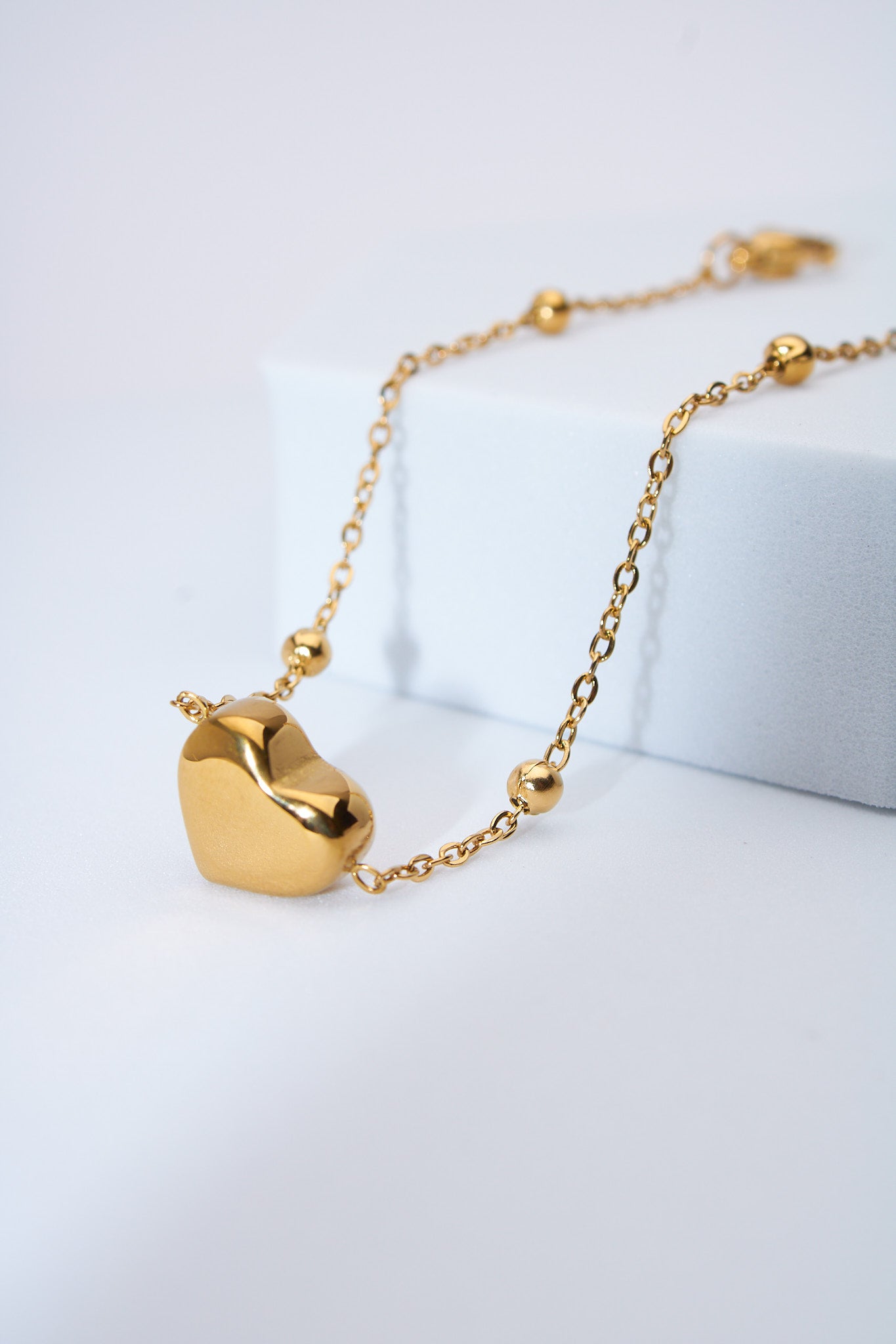 Pulsera corazón macizo dorado — baño dorado