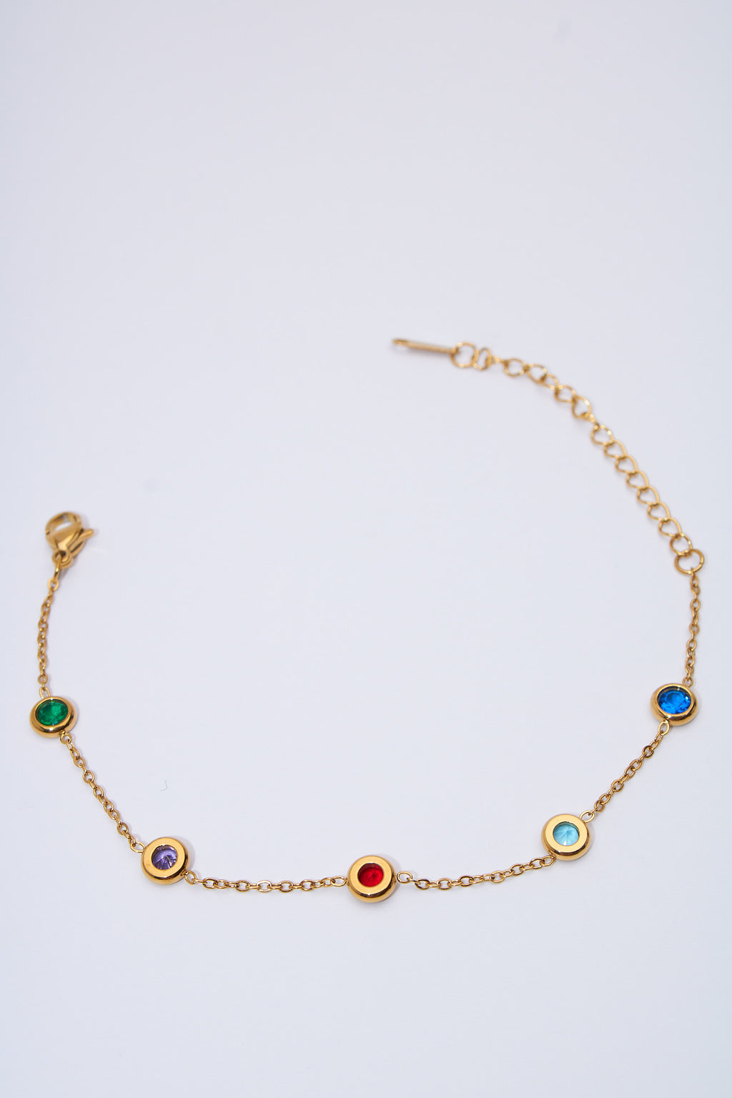 Pulsera con cristales multicolor — baño dorado