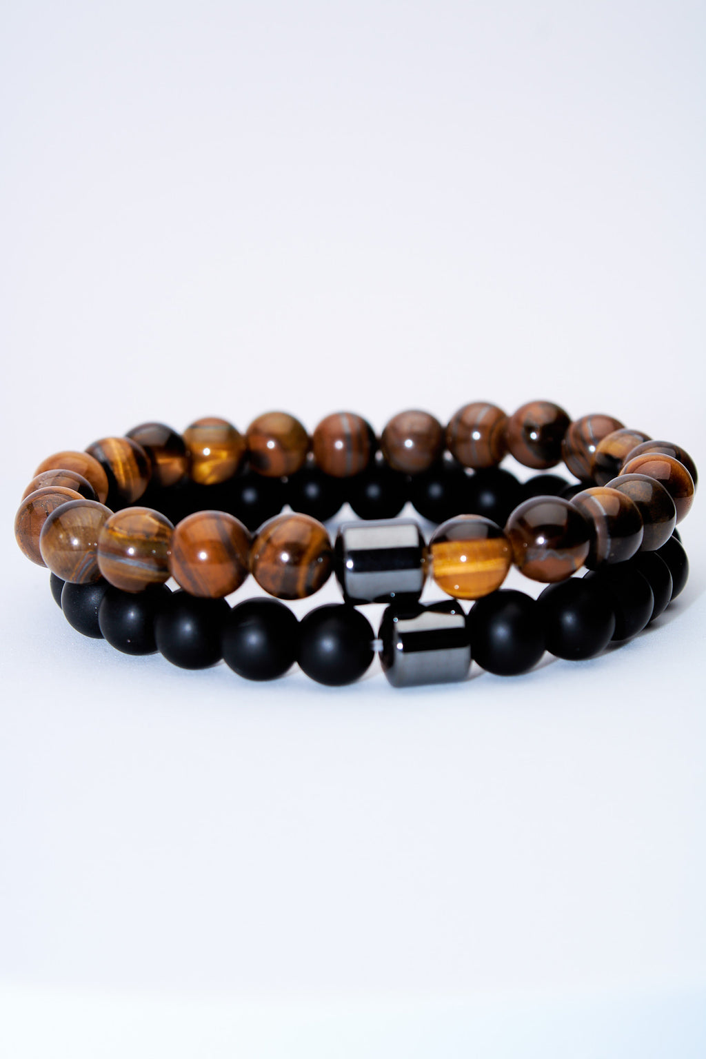 Set pulseras elasticas ojo de tigre y lava negra