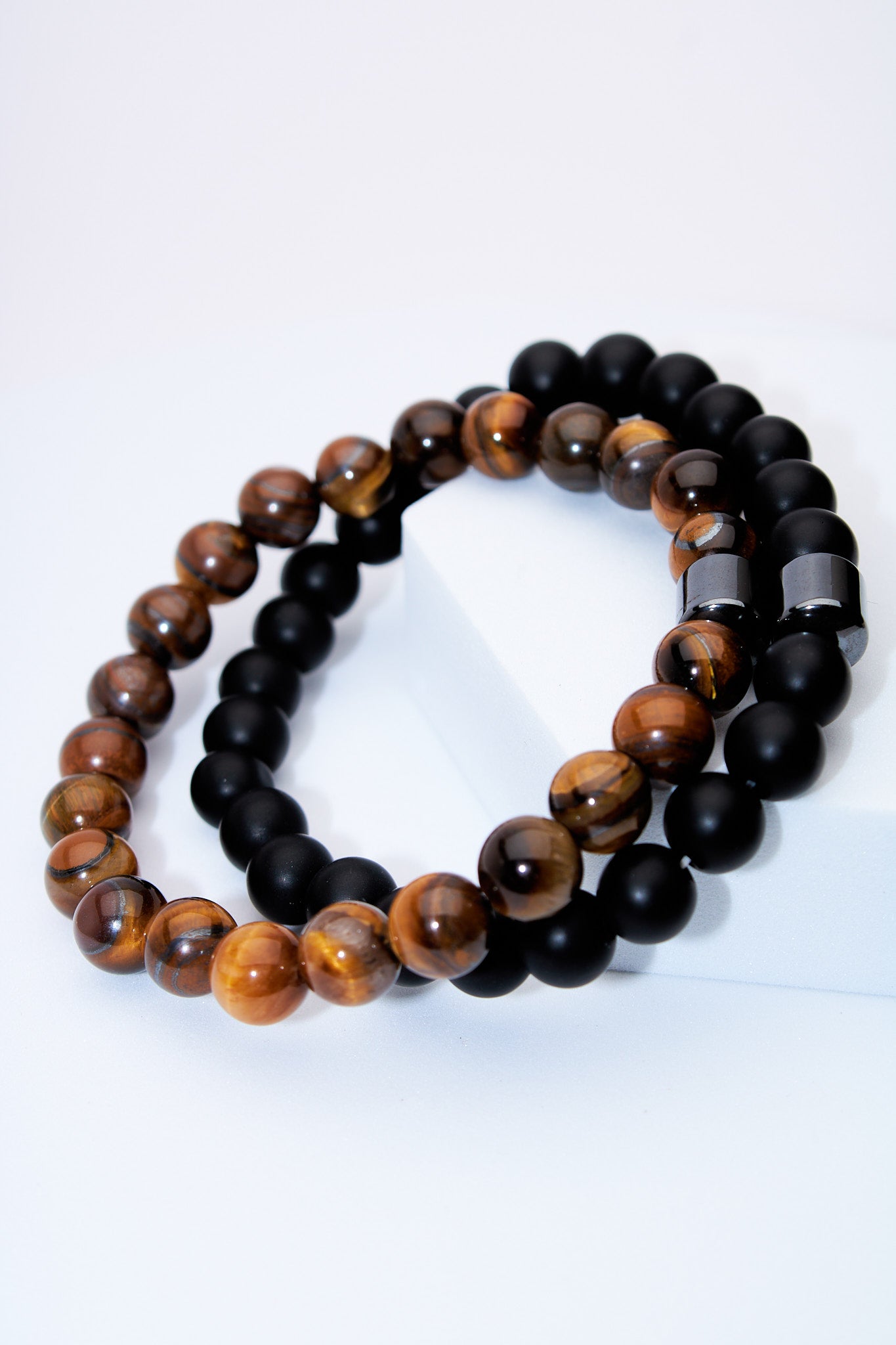 Set pulseras elasticas ojo de tigre y lava negra
