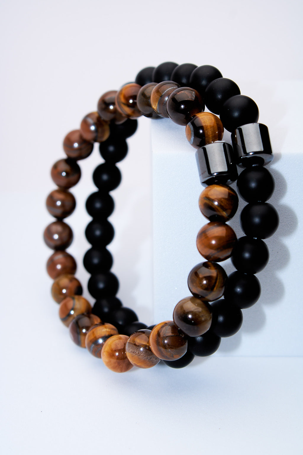 Set pulseras elasticas ojo de tigre y lava negra