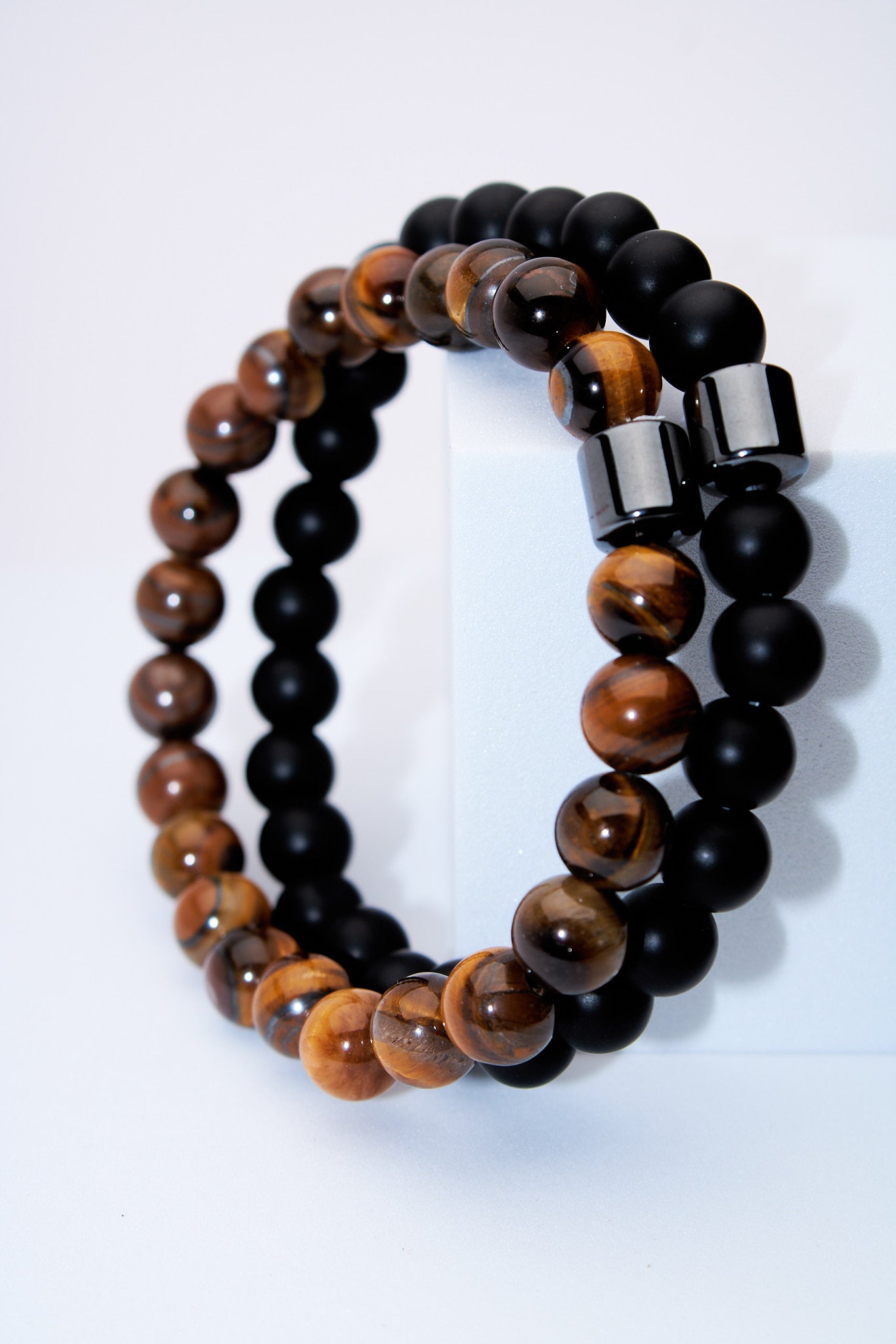 Set pulseras elasticas ojo de tigre y lava negra