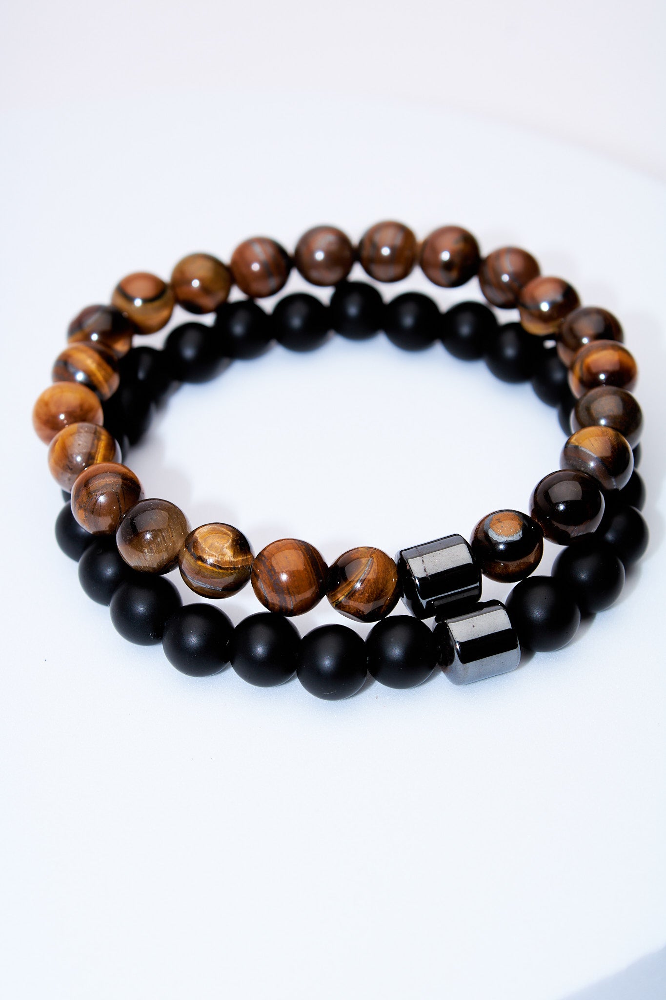 Set pulseras elasticas ojo de tigre y lava negra