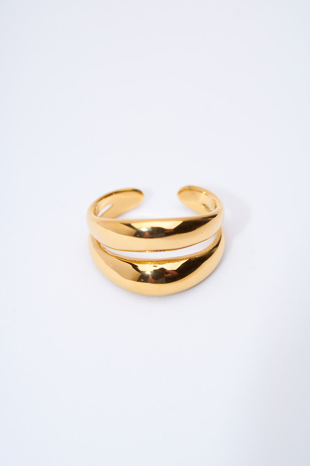 Anillo doble curva — baño dorado