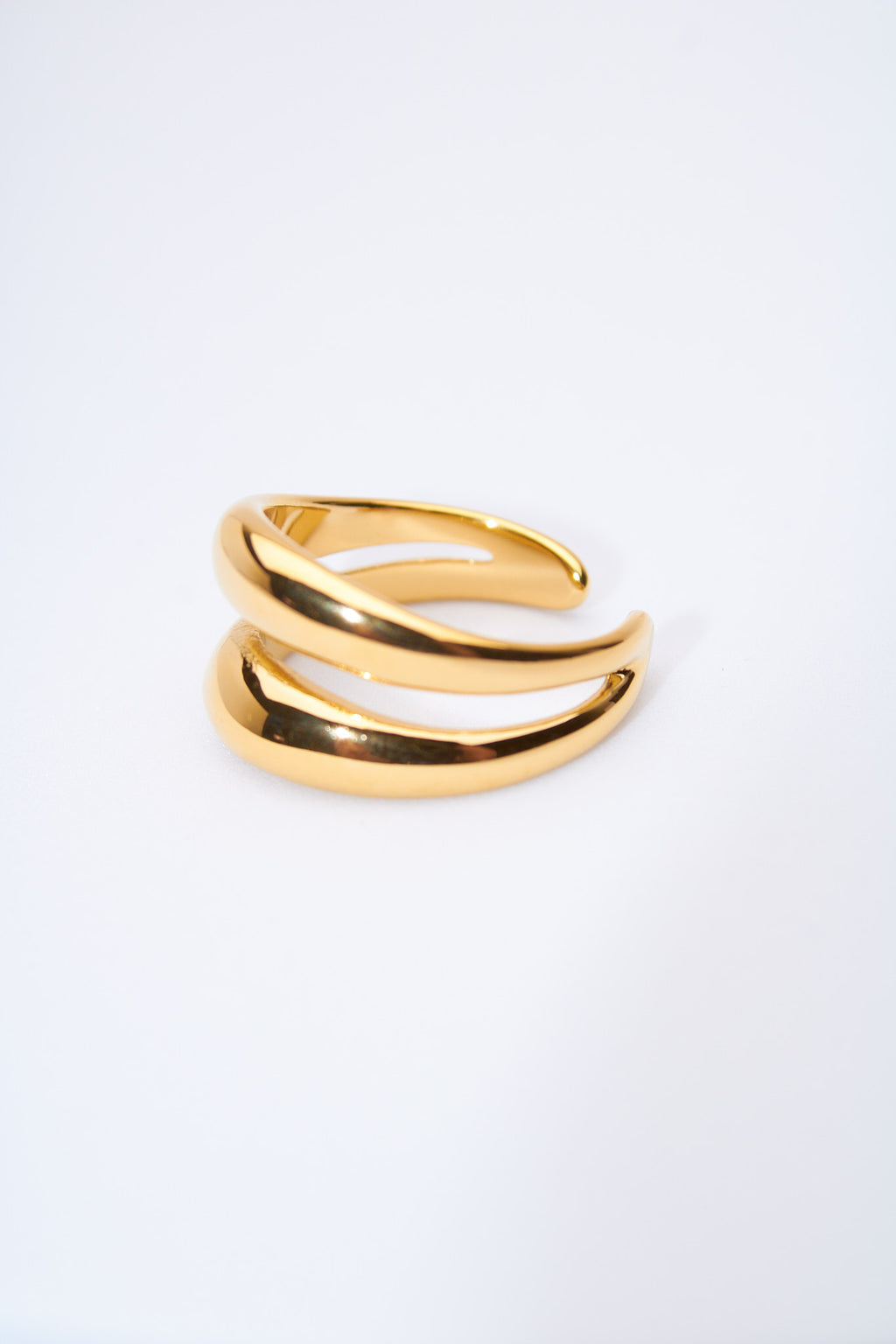 Anillo doble curva — baño dorado