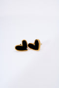 Aretes corazón esmaltado negro — marco dorado