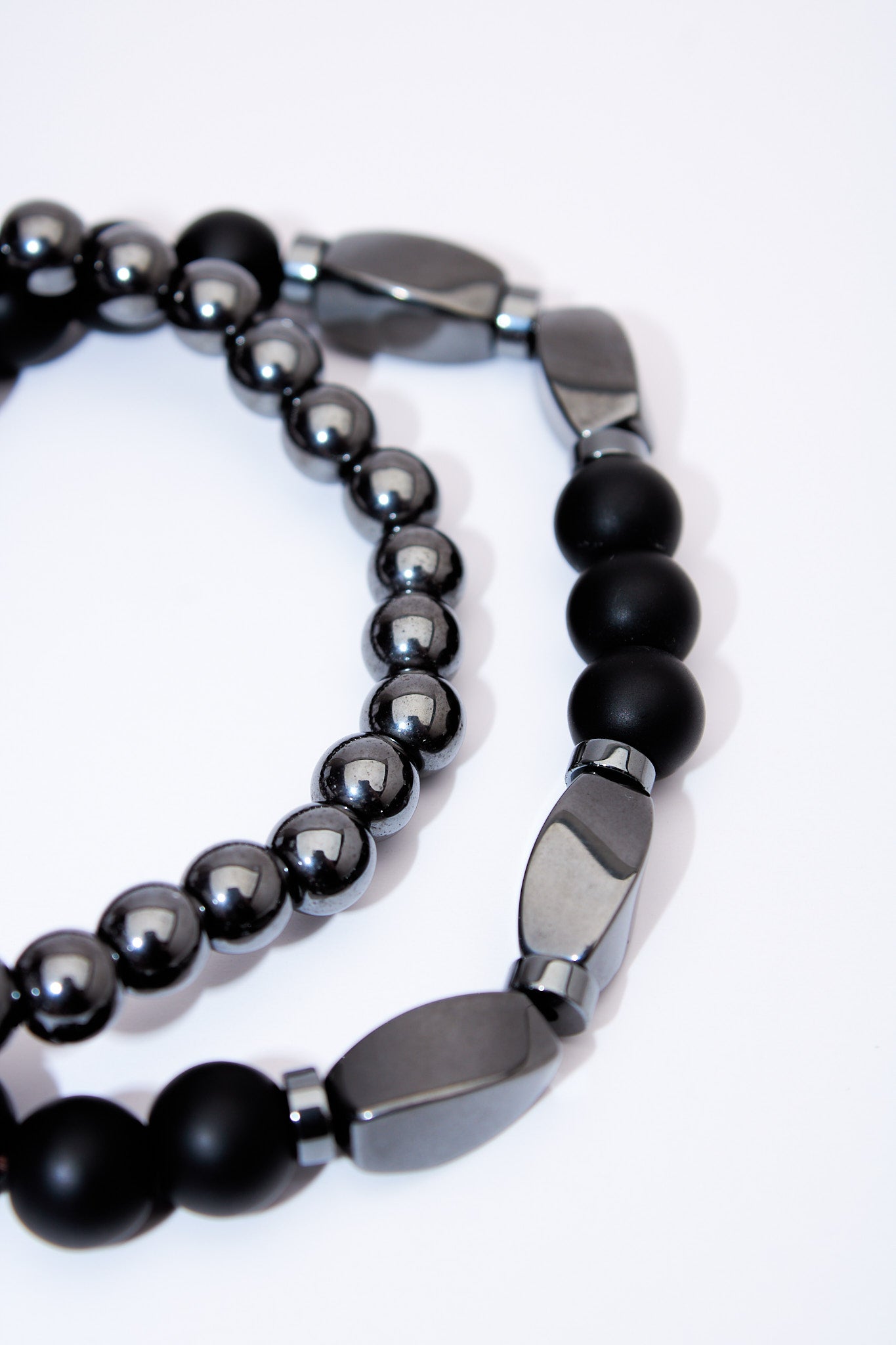 Set pulseras elásticas — lava negra, ónix y hematita con separadores pavé