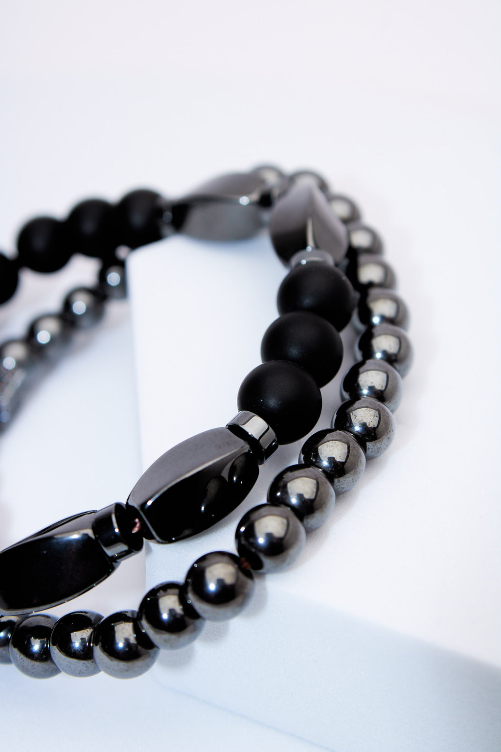Set pulseras elásticas — lava negra, ónix y hematita con separadores pavé