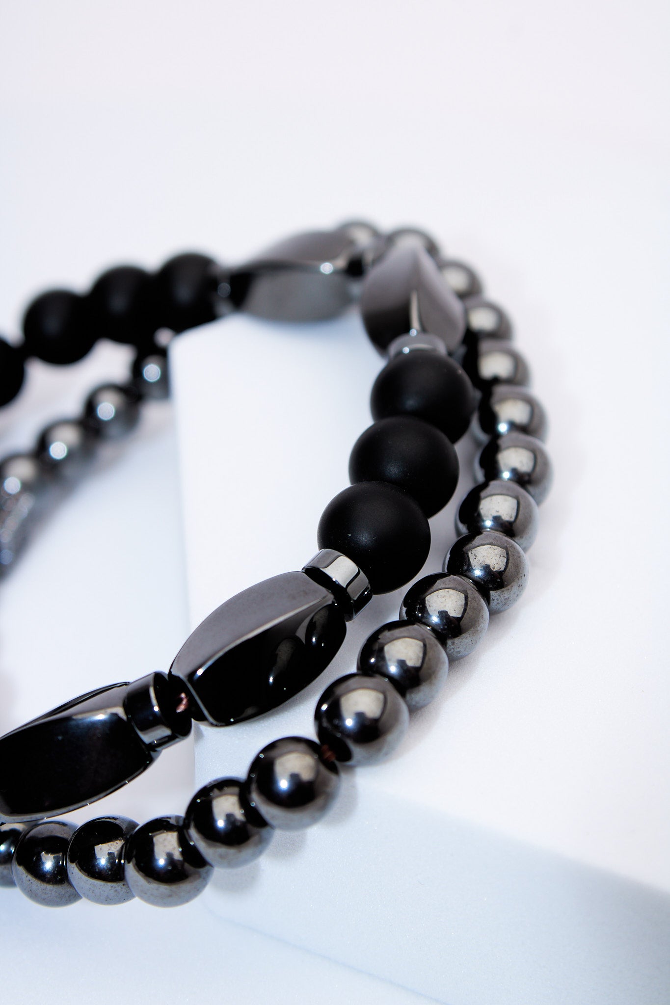 Set pulseras elásticas — lava negra, ónix y hematita con separadores pavé