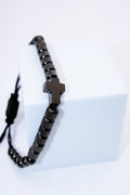 Pulsera ajustable con cruz hematita y trenzado texturizado