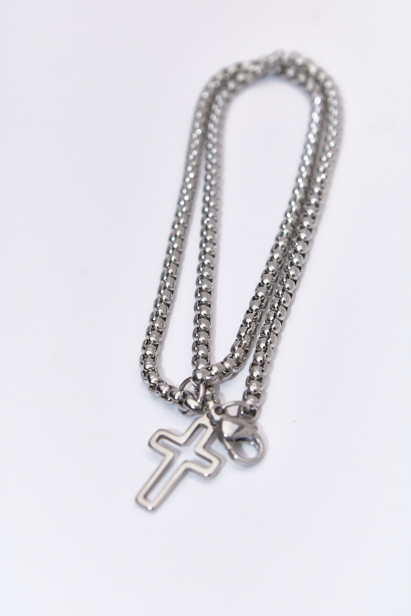Pulsera doble capa con cruz hueca