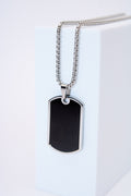 Collar placa octogonal negra — acero inoxidable plateado